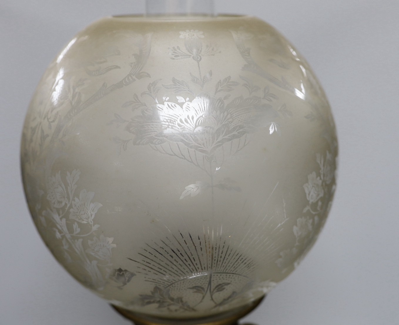 A Victorian clear glass oil lamp. 73cm tall